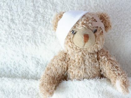 Brain injury compensation concept teddy bear